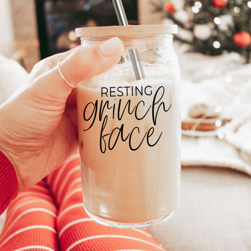 Grinch Face 17oz glass cup by Gia Roma with lid and straw featuring resting grinch face script drinkware on Tampa Home & Garden Store