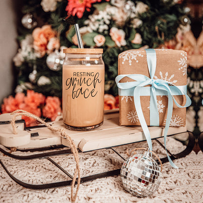 Grinch Face 17oz glass cup set by Gia Roma with cork lid and straw resting grinch face text on Tampa Home & Garden Store
