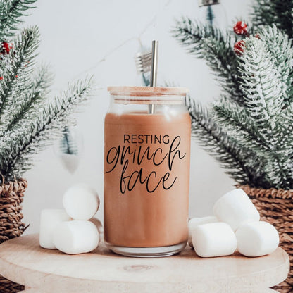 17oz glass cup with peach drink and metal straw, Grinch Face design on Tampa Home & Garden Store
