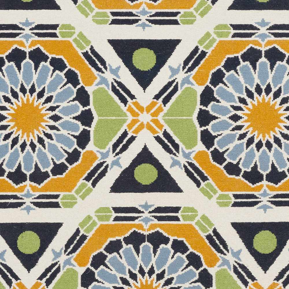 Greenough Area Carpet by Boutique Rugs with pattern in navy, orange, lime green, and blue on Tampa Home & Garden Store