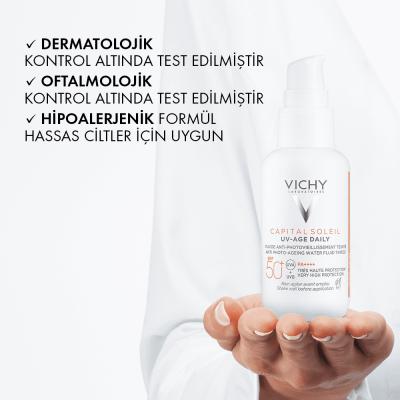 Vichy Capital Soleil UV-Age Tinted Sunscreen SPF50+ 40ml white bottle held in hand on Tampa Home & Garden Store