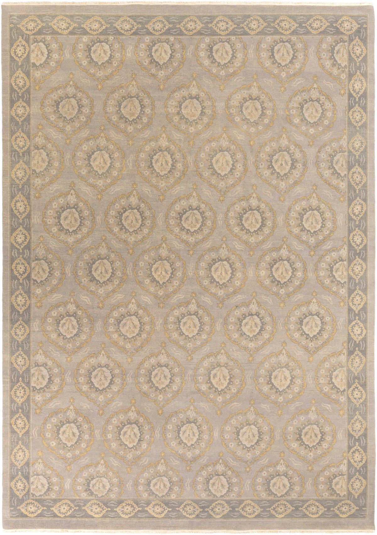 Haleiwa Clearance Rug by Boutique Rugs, gray field with gold teardrop medallions and pale border on Tampa Home & Garden Store