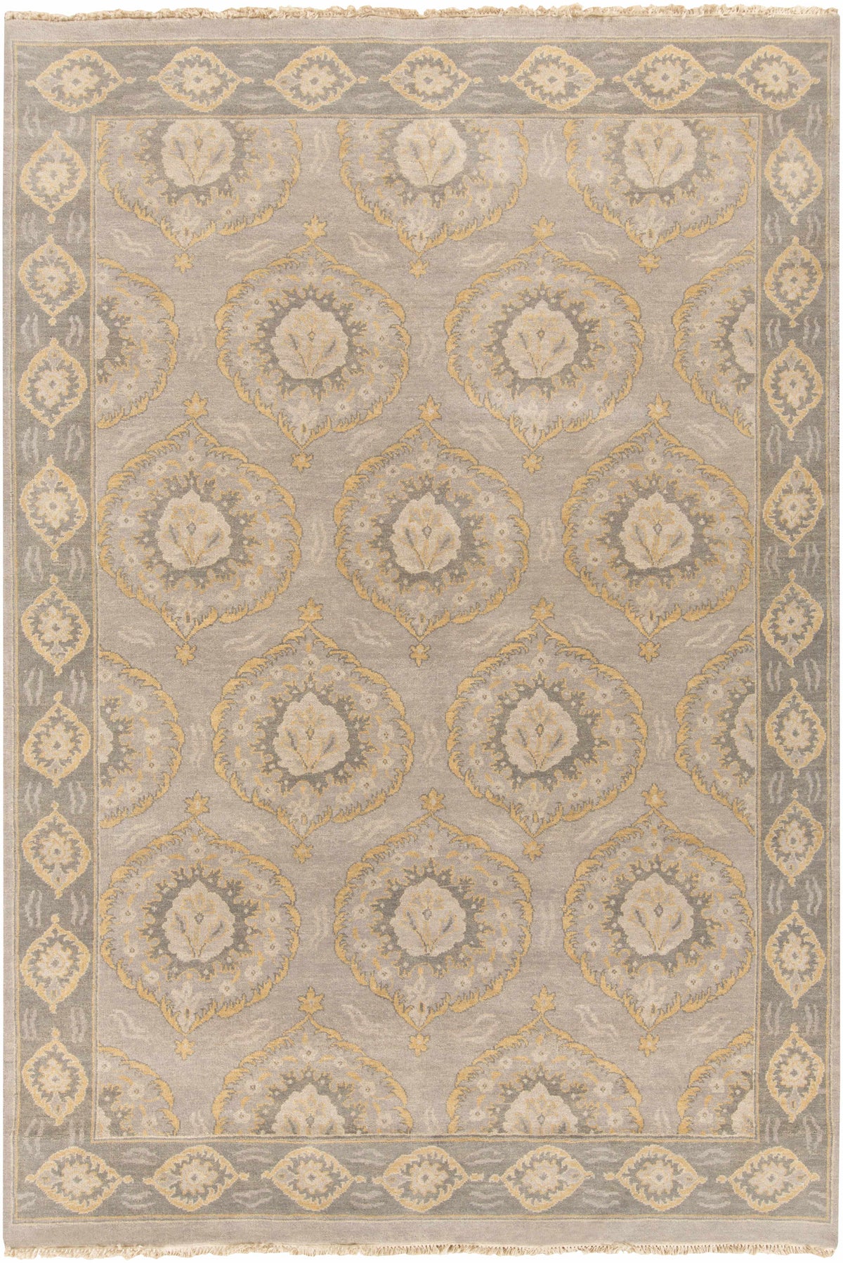 Haleiwa Clearance Rug, taupe gray field with cream and gold medallions, fringed border on Tampa Home & Garden Store