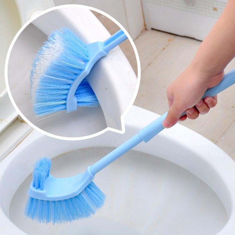 Handheld blue toilet cleaning brush with curved head and blue bristles on Tampa Home & Garden Store
