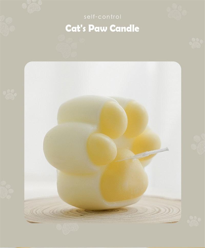 Cat's Paw candle, paw-shaped white candle with yellow toe pads by Stevvex on Tampa Home & Garden Store