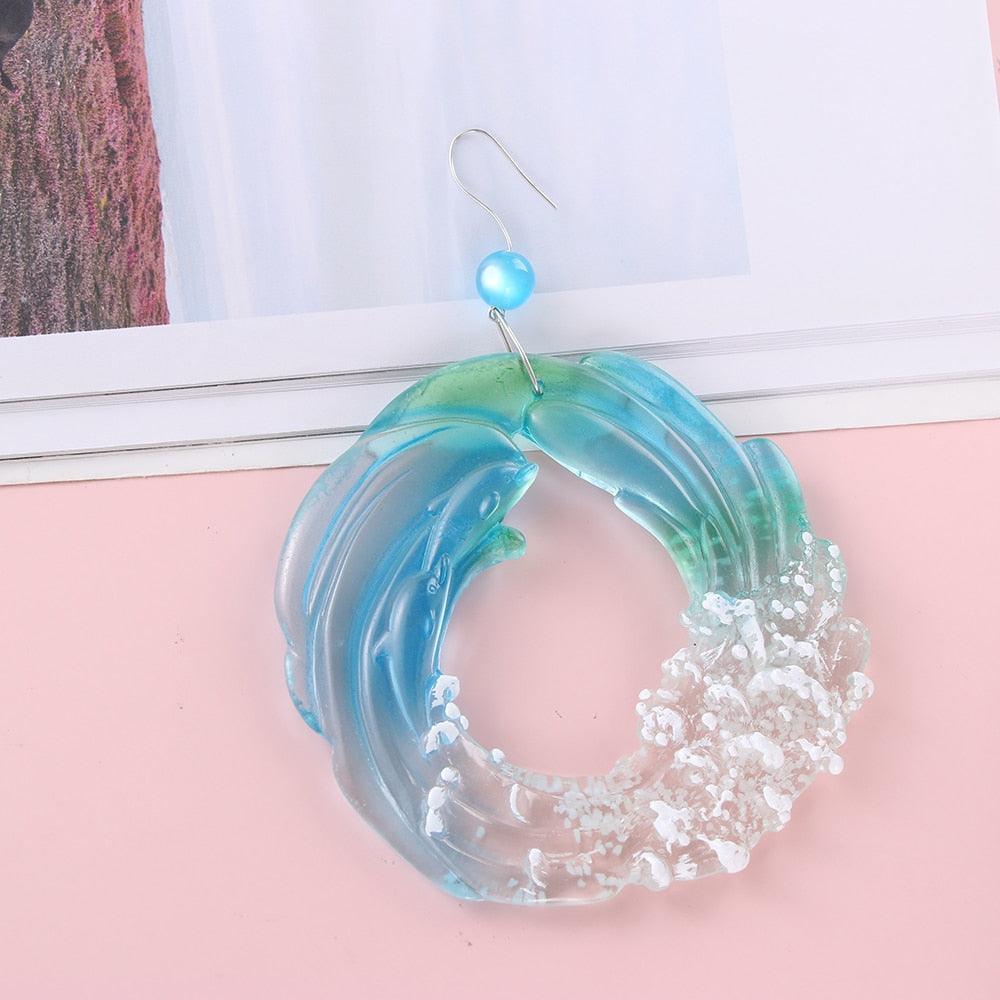 Stevvex ocean sun-catcher wind chime, blue-green acrylic ring with coral accents, hanging decor on Tampa Home & Garden Store