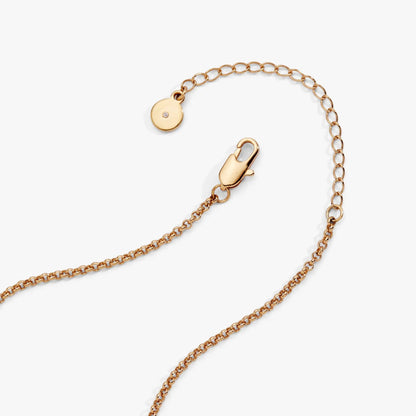 Rose gold chain necklace with a round disk pendant featuring a small crystal on Tampa Home & Garden Store
