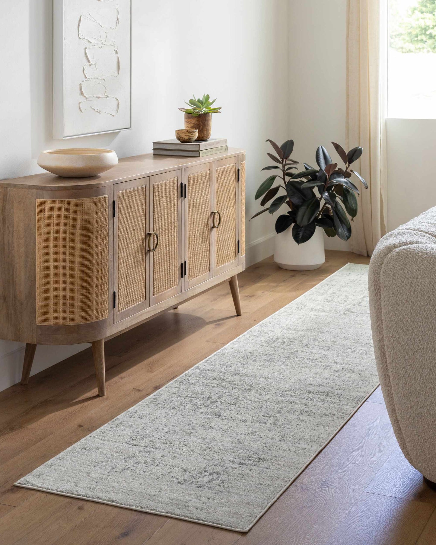 Rachel Area Rug by Boutique Rugs in light gray with subtle textured pattern on Tampa Home & Garden Store