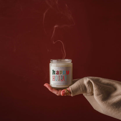 Happy Holiday Candle by Gia Roma in a white jar with colorful label, soy wax, hand-held on Tampa Home & Garden Store