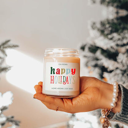 Happy Holiday Candle by Gia Roma in a clear jar with white soy wax and a colorful HOLIDAYS label on Tampa Home & Garden Store