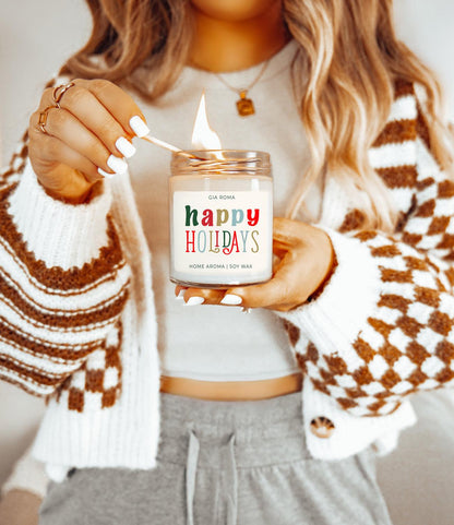 Candle Gia Roma Happy Holidays soy wax in glass jar lit by a match on Tampa Home & Garden Store