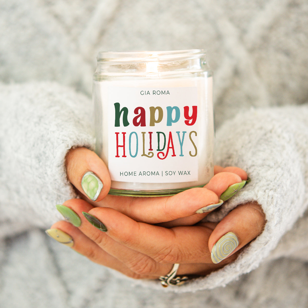 Candle Happy Holiday by Gia Roma in a clear glass jar, soy wax, multicolor HOLIDAYS label on Tampa Home & Garden Store