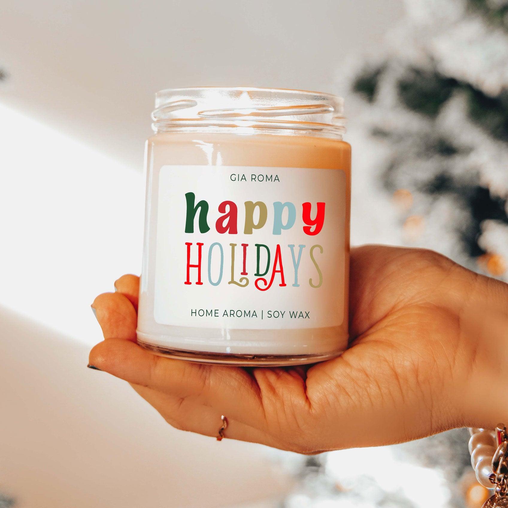 Happy Holiday Candle by Gia Roma in peach soy wax, clear glass jar with colorful label on Tampa Home & Garden Store