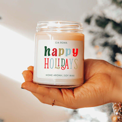 Happy Holiday Candle by Gia Roma in peach soy wax, clear glass jar with colorful label on Tampa Home & Garden Store