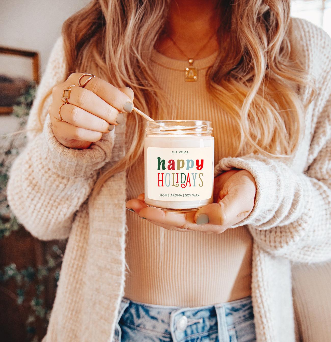 Happy Holiday Candle Gia Roma, soy wax in a clear jar with a colorful holiday label on Tampa Home & Garden Store