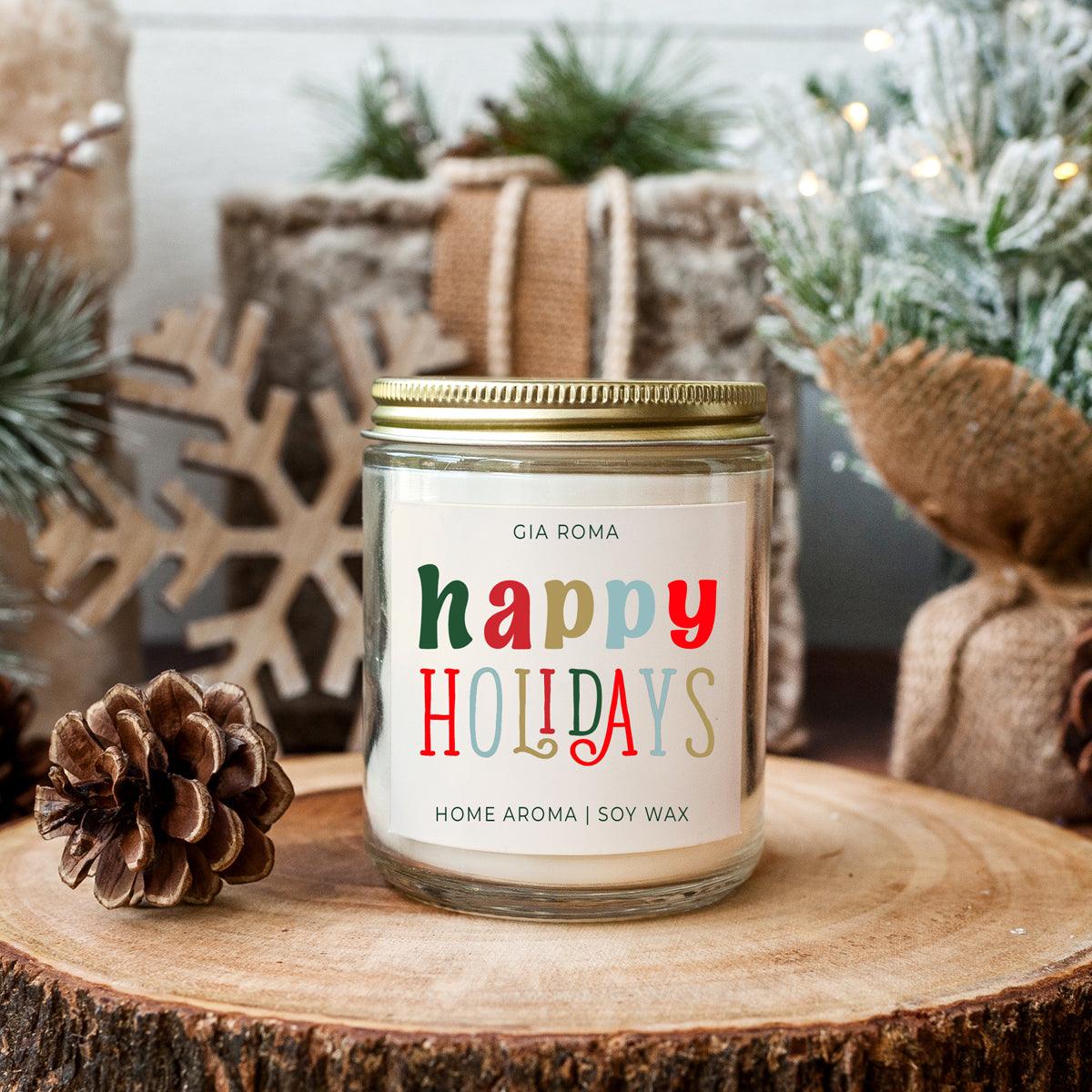 Happy Holiday Candle by Gia Roma in a clear glass jar with a gold lid, soy wax, home aroma on Tampa Home & Garden Store