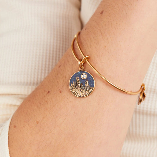 Harry Potter Hogwarts Castle charm bangle with enamel castle pendant on gold-tone bracelet on Tampa Home & Garden Store