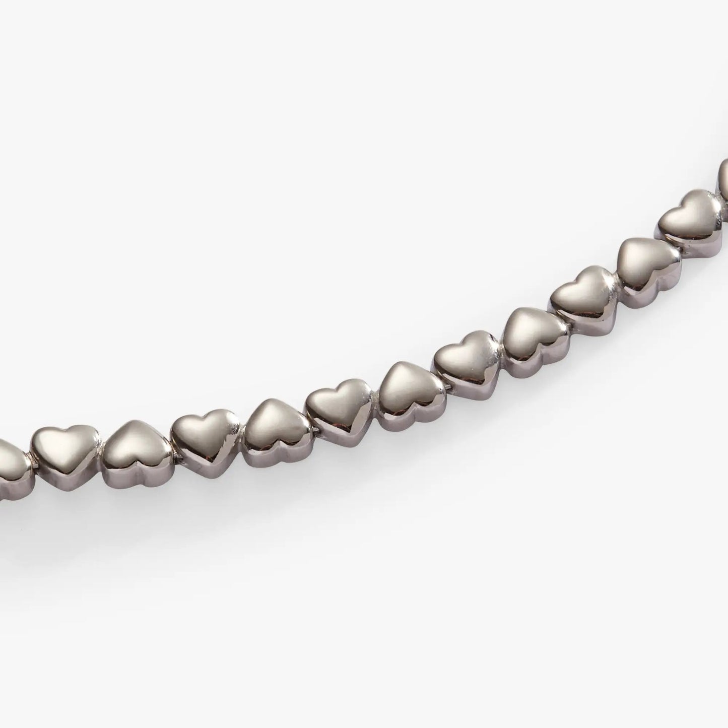Heart Charm Tennis Bracelet with silver-tone heart-shaped links on Tampa Home & Garden Store