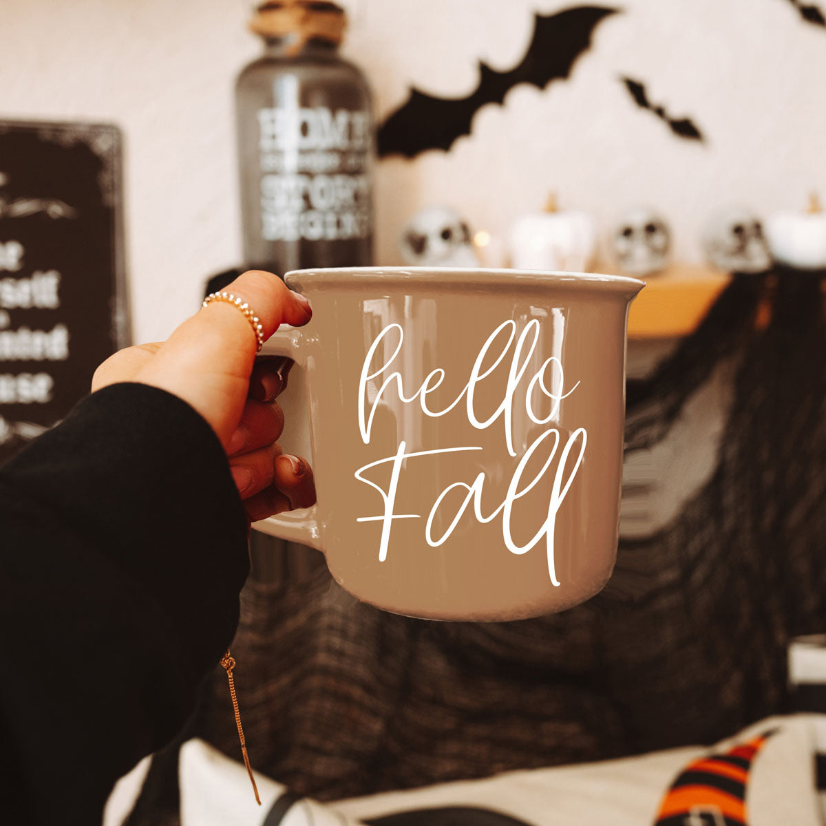 Hello Fall coffee mug by Gia Roma in taupe ceramic, held by hand on Tampa Home & Garden Store