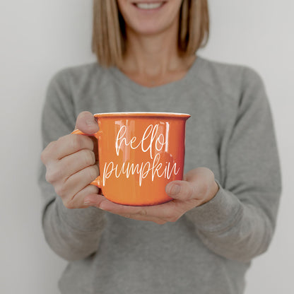 Hello Pumpkin coffee mug orange ceramic by Gia Roma held in hands on Tampa Home & Garden Store