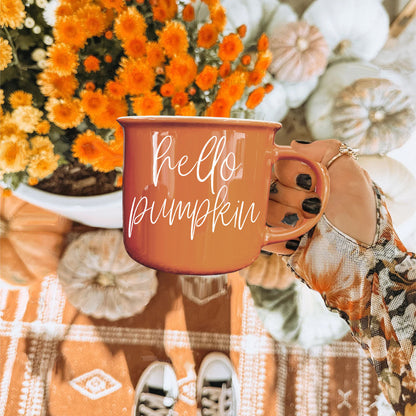 Hello Pumpkin mug by Gia Roma, orange ceramic mug with white script, bouquet backdrop on Tampa Home & Garden Store