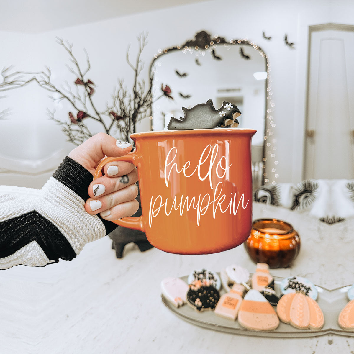 Hello Pumpkin coffee mug orange Gia Roma with white script text and bat-shaped topper on Tampa Home & Garden Store