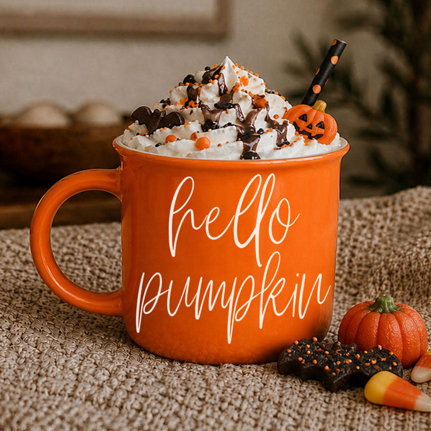 Hello Pumpkin coffee mug by Gia Roma, orange ceramic mug with white script and whipped cream on Tampa Home & Garden Store
