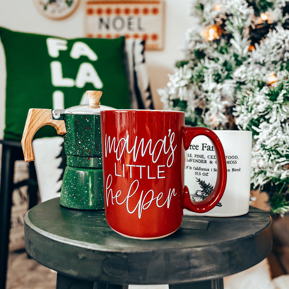 Gia Roma Mama's Little Helper coffee mug red with white script, two mugs on dark table on Tampa Home & Garden Store