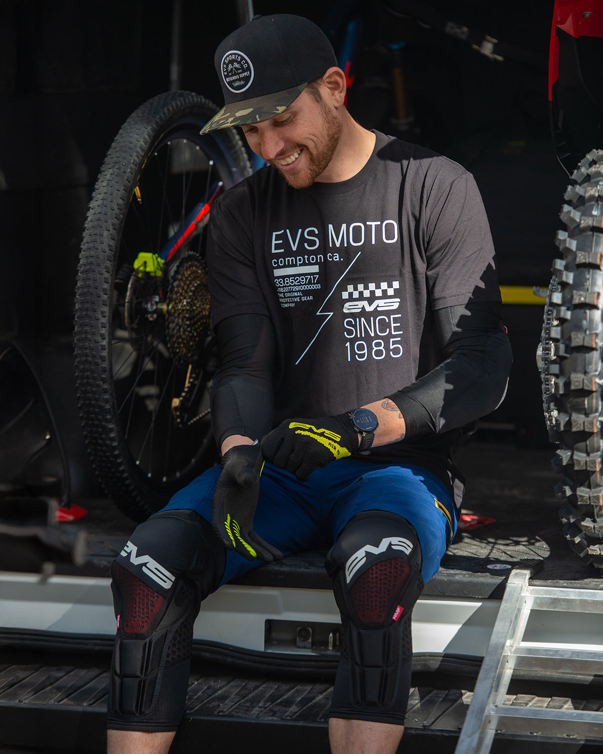 EVS Hex Pro MTB Knee Guard, black protective knee pads with hard shell worn by rider on Tampa Home & Garden Store