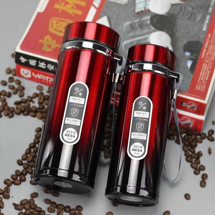Stevvex red stainless steel vacuum insulated thermos mugs, two travel bottles with straps on Tampa Home & Garden Store