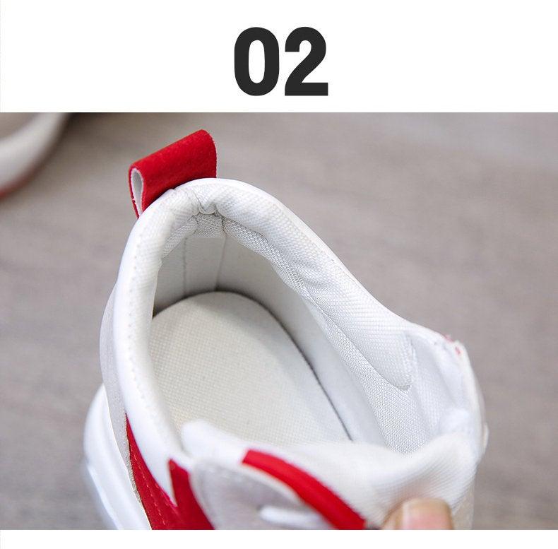 Stevvex sneakers white with red accents, padded white interior, lace-up casual athletic shoes on Tampa Home & Garden Store