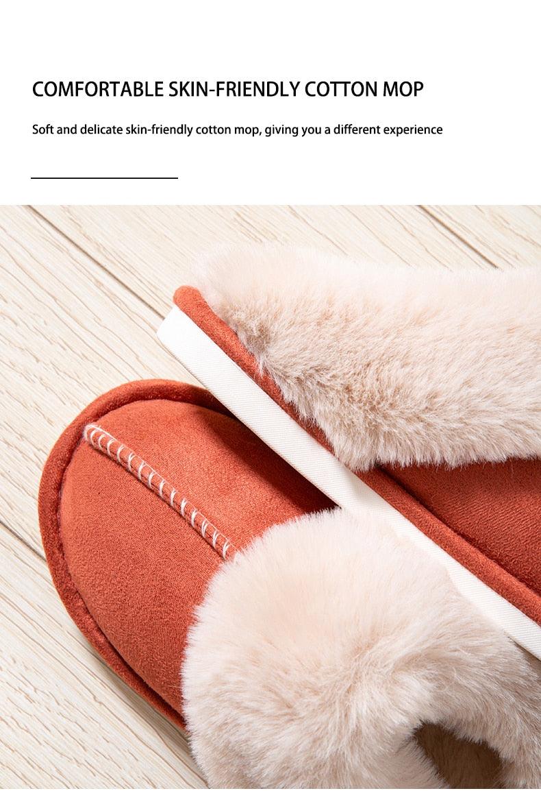 Women's orange suede slippers with plush cream fur lining and white sole on Tampa Home & Garden Store