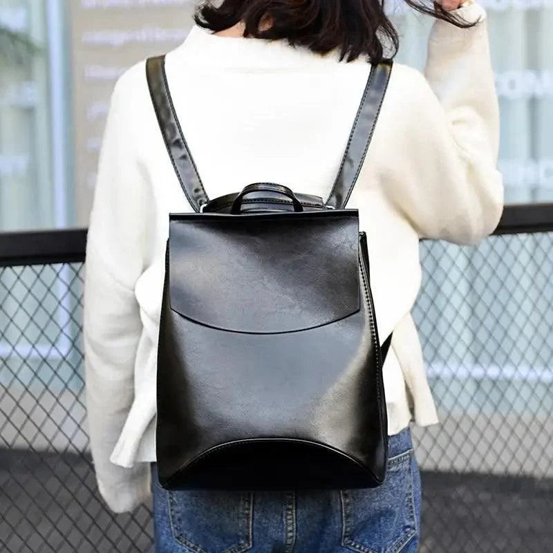 Stevvex black leather backpack with top handle, large capacity on Tampa Home & Garden Store