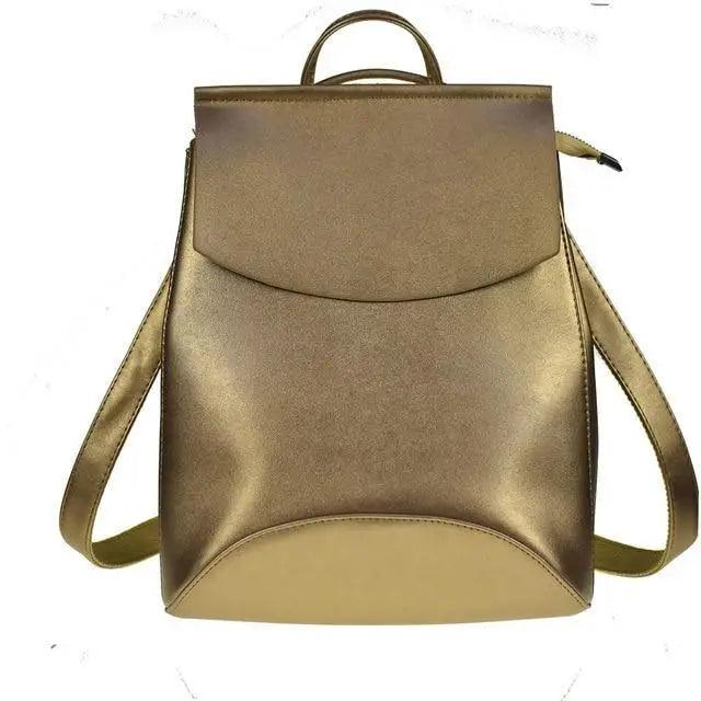 Leather backpack Stevvex ALU77184HCR in metallic gold with curved flap and top handle on Tampa Home & Garden Store