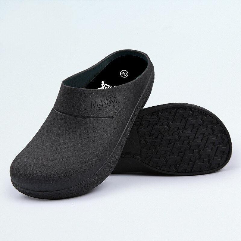 Stevvex black non-slip waterproof kitchen slippers with closed toe and textured sole on Tampa Home & Garden Store
