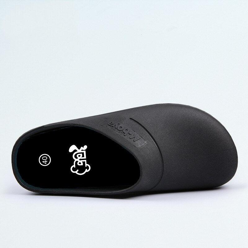 Stevvex black non-slip waterproof kitchen slippers with slip-on design on Tampa Home & Garden Store
