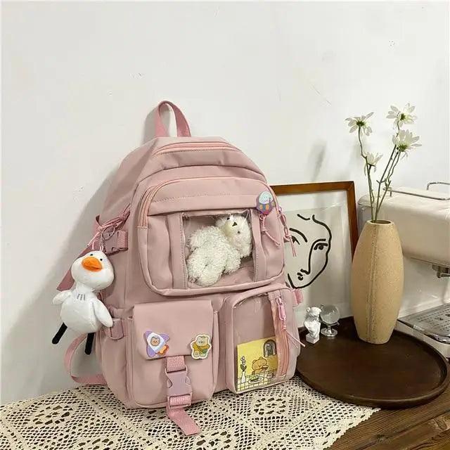 Stevvex pink nylon waterproof school backpack with pockets and plush keychain on Tampa Home & Garden Store