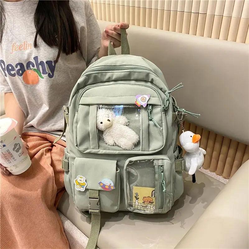 Stevvex nylon waterproof school backpack in sage green with clear pockets and plush keychain on Tampa Home & Garden Store
