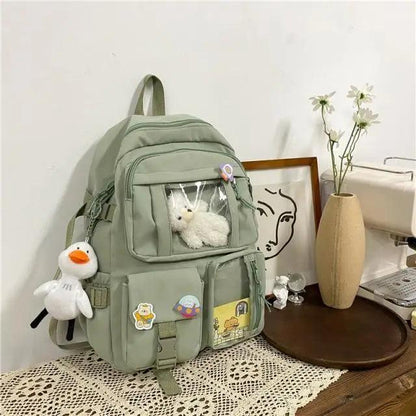 Stevvex nylon waterproof backpack olive green with pockets and plush bunny in front pocket on Tampa Home & Garden Store