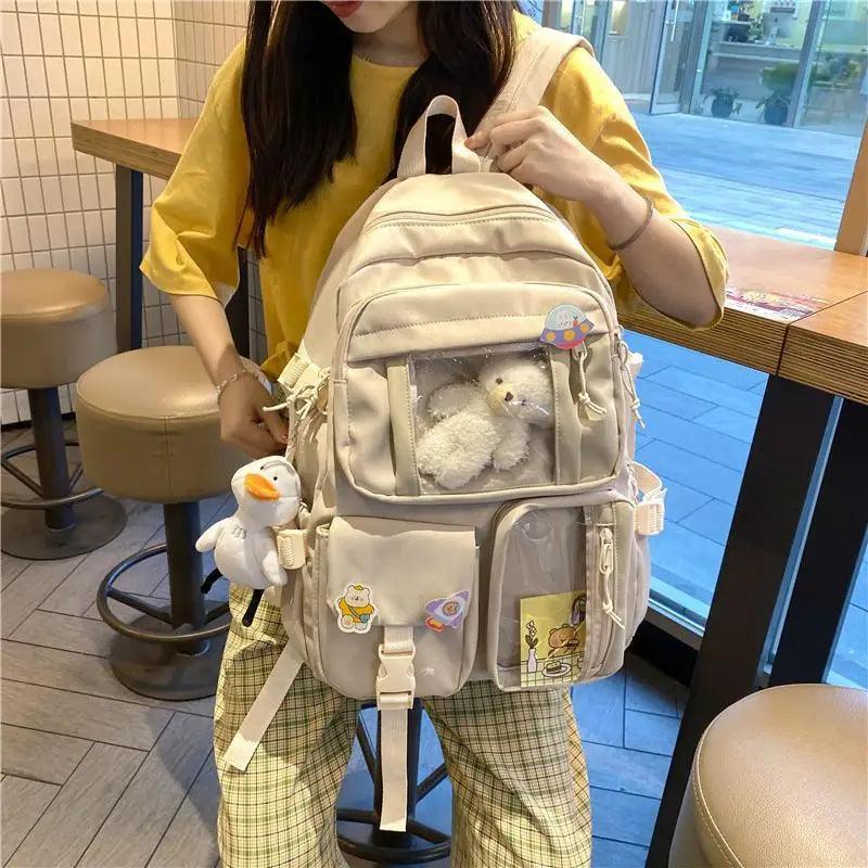 Stevvex ALU92983ZYX nylon large capacity waterproof school backpack cream with pockets on Tampa Home & Garden Store