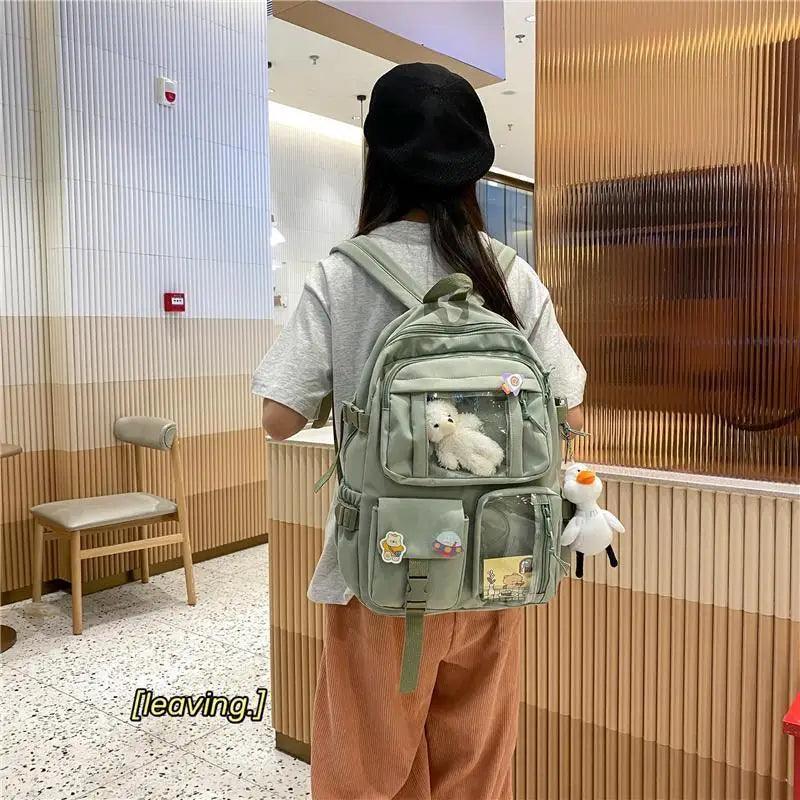Stevvex large-capacity nylon waterproof school backpack in sage green with multiple pockets on Tampa Home & Garden Store