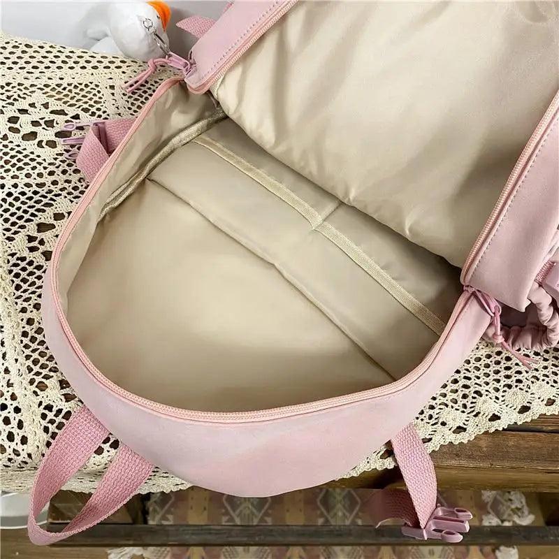 Stevvex pink nylon large-capacity waterproof backpack with beige lining inside, school backpack on Tampa Home & Garden Store