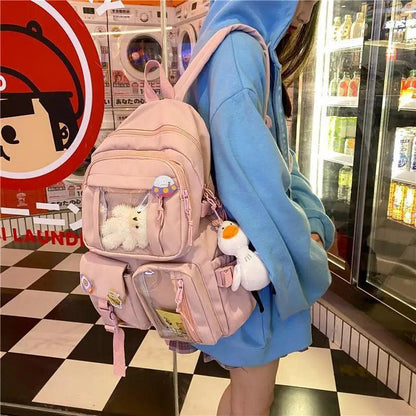 Stevvex pink nylon large-capacity waterproof school backpack with plush charms on Tampa Home & Garden Store