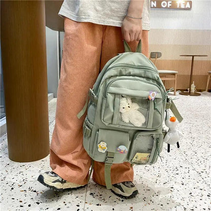 Nylon large-capacity waterproof backpack in sage green with multiple pockets and cute patches on Tampa Home & Garden Store