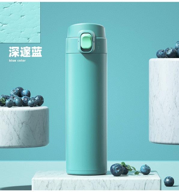 Stainless steel thermos bottle blue with push-button lid by Stevvex, portable vacuum flask on Tampa Home & Garden Store