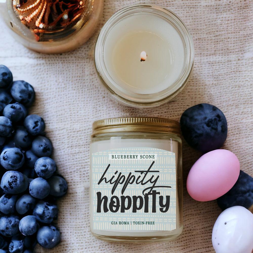 Blueberry Scone Candle Gia Roma in a clear glass jar with a gold lid, blueberries nearby on Tampa Home & Garden Store
