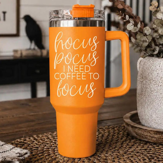 Gia Roma Hocus Pocus 40oz orange travel mug with white cursive slogan and orange lid on Tampa Home & Garden Store