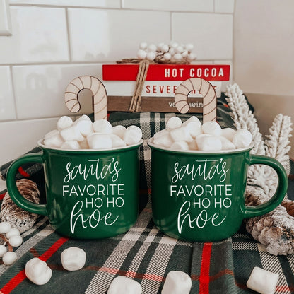 Ho Ho Hoe mug pair in green ceramic by Gia Roma with Santa's Ho Ho Hoe script and marshmallows on Tampa Home & Garden Store