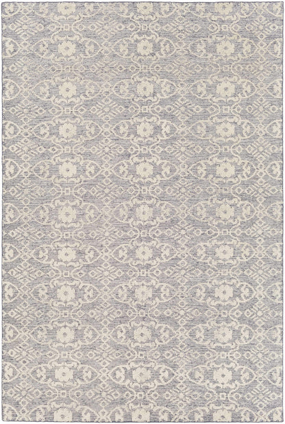 Hoisington Ivory Patterned Wool Rug by Boutique Rugs in gray-blue and ivory on Tampa Home & Garden Store