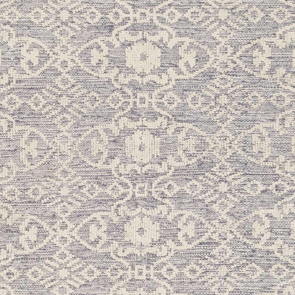 Hoisington Ivory Patterned Wool Rug by Boutique Rugs in ivory and blue-gray motif on Tampa Home & Garden Store
